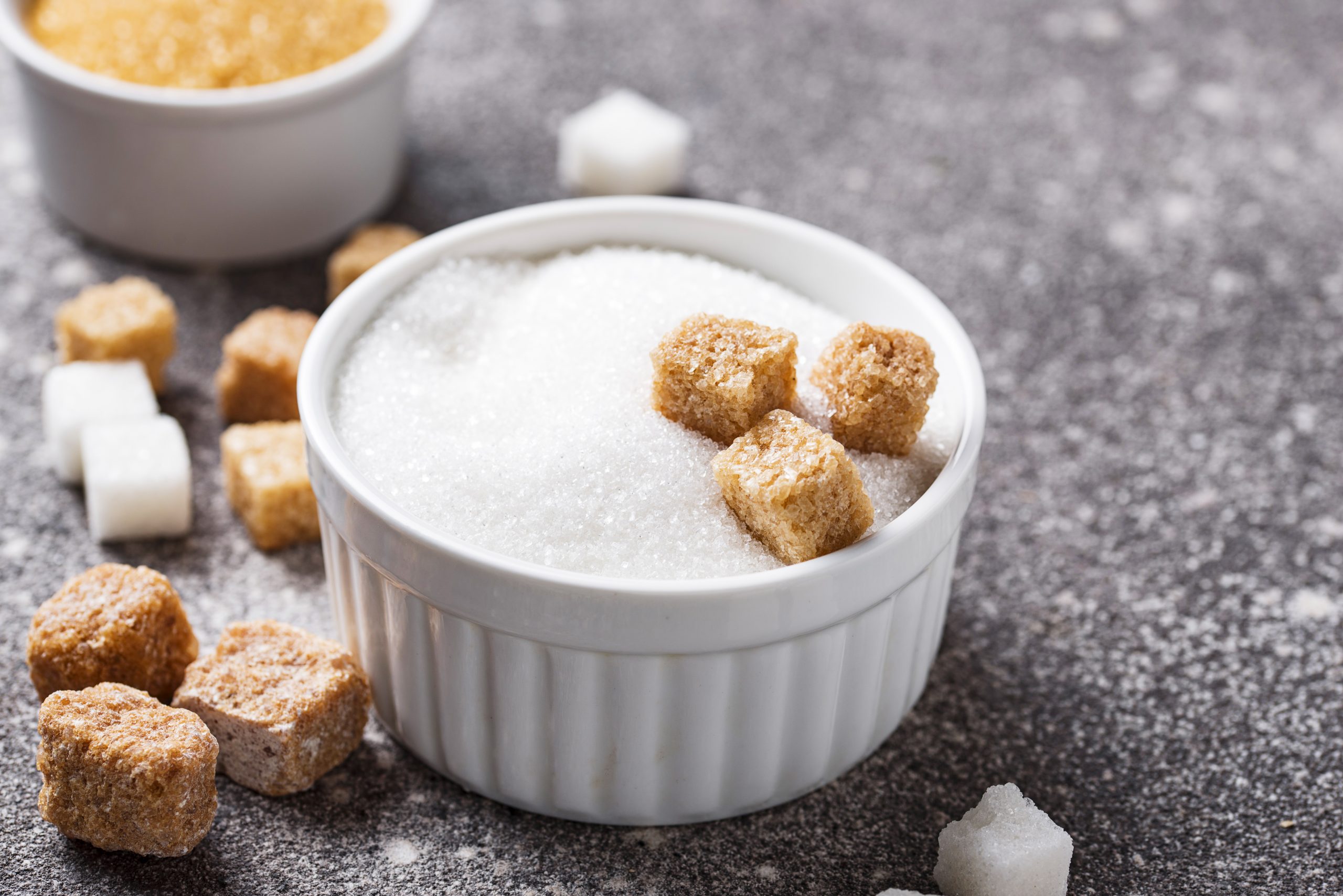 Assortment of white and brown cane sugar