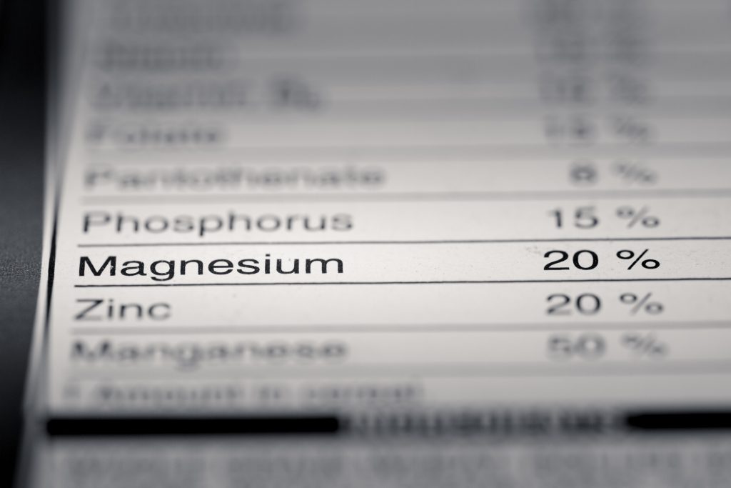 Shallow depth of Field image of Nutrition Facts Magnesium Information we can find on a grocery Store Product.