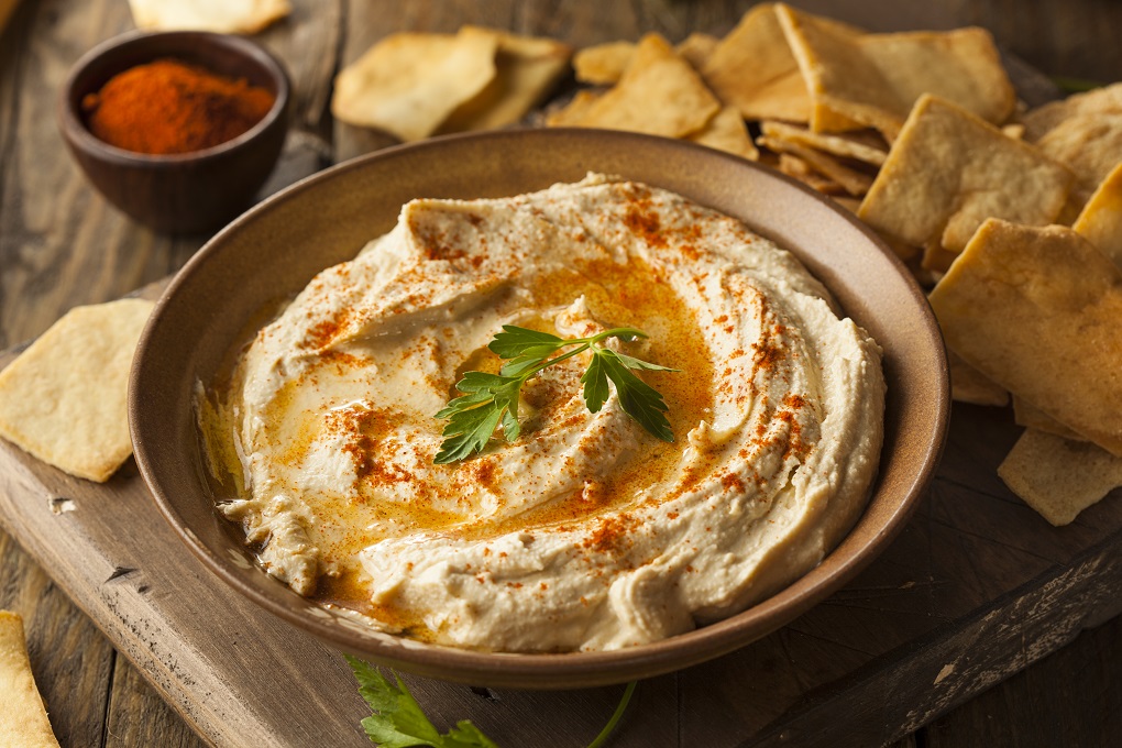 Healthy Homemade Creamy Hummus with Olive Oil and Pita Chips