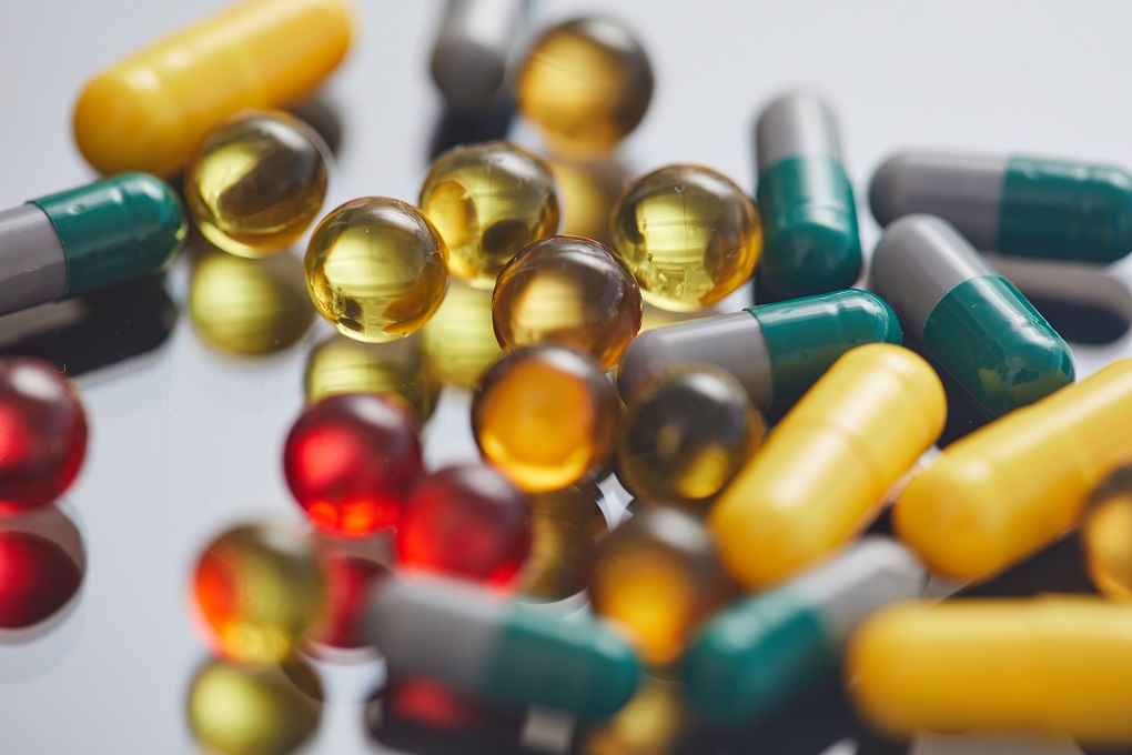 Close-up of abundance pills on the table preparing to treat the disease