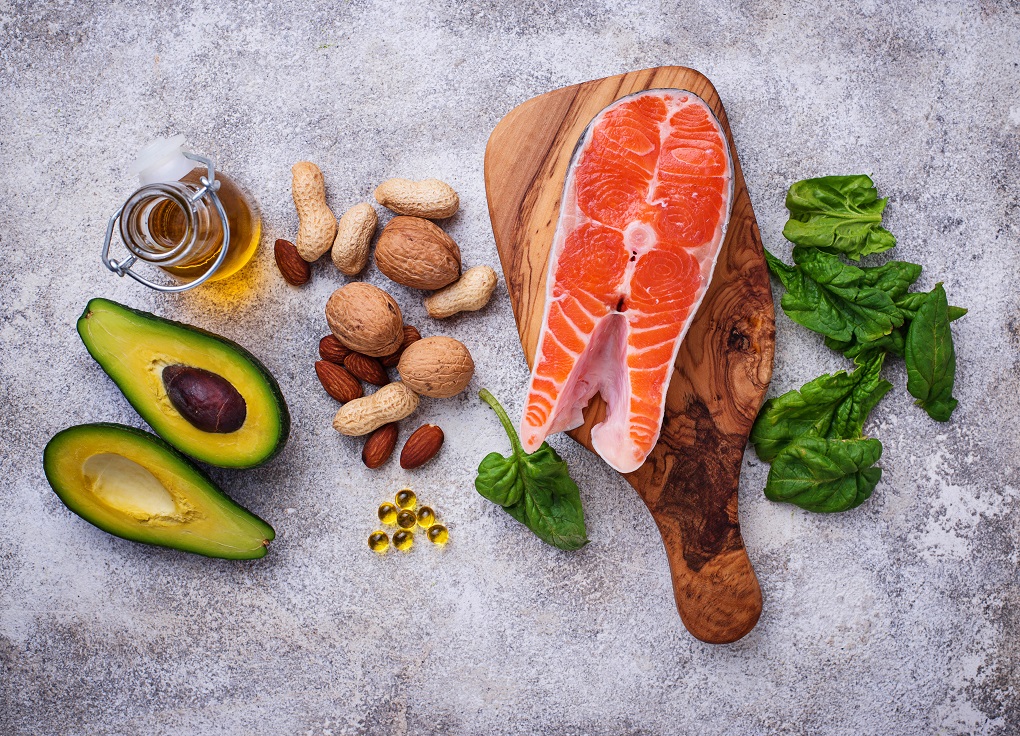 Selection of healthy fat and omega 3 sources. Pruducts and fish oil capules. Top view